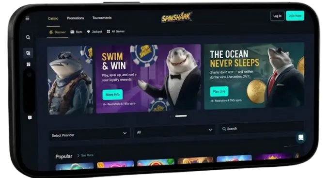 A mobile phone displaying the SpinShark Casino homepage with promotional banners, illustrating the site's mobile optimization and responsive design for convenient on-the-go gaming.